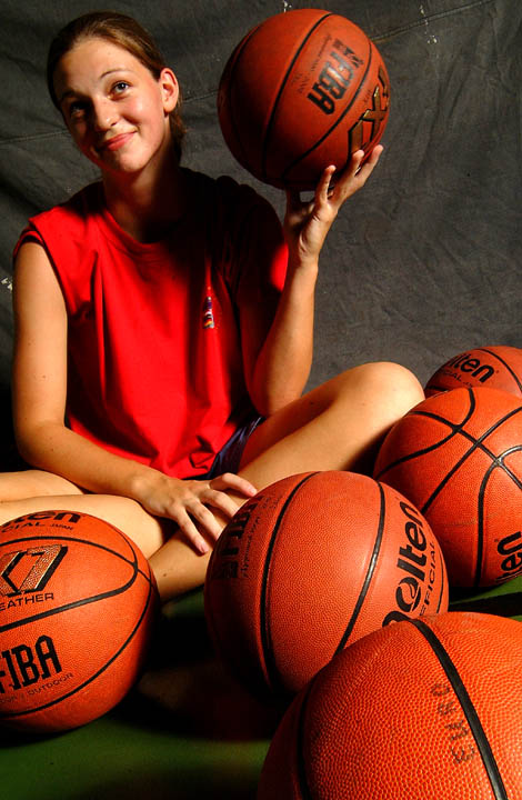 girl playing basketball